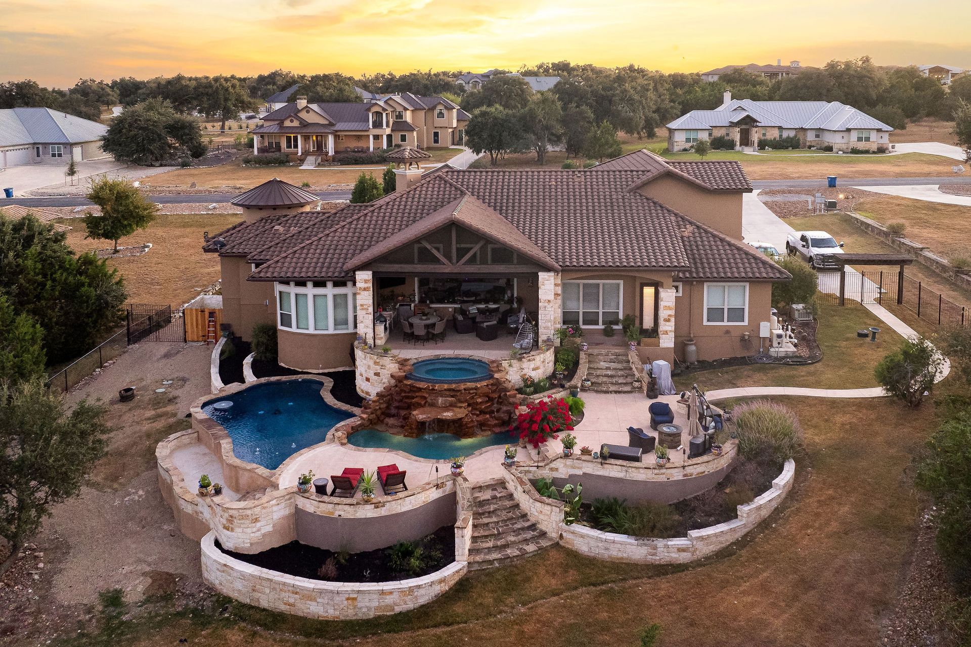 backyard pool at sunset