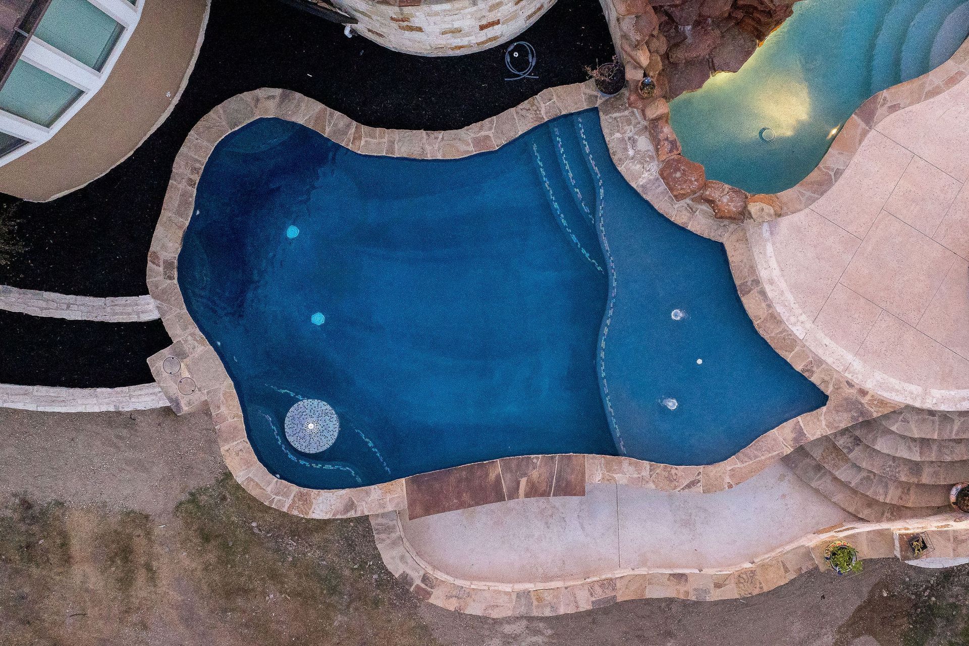 backyard pool at sunset