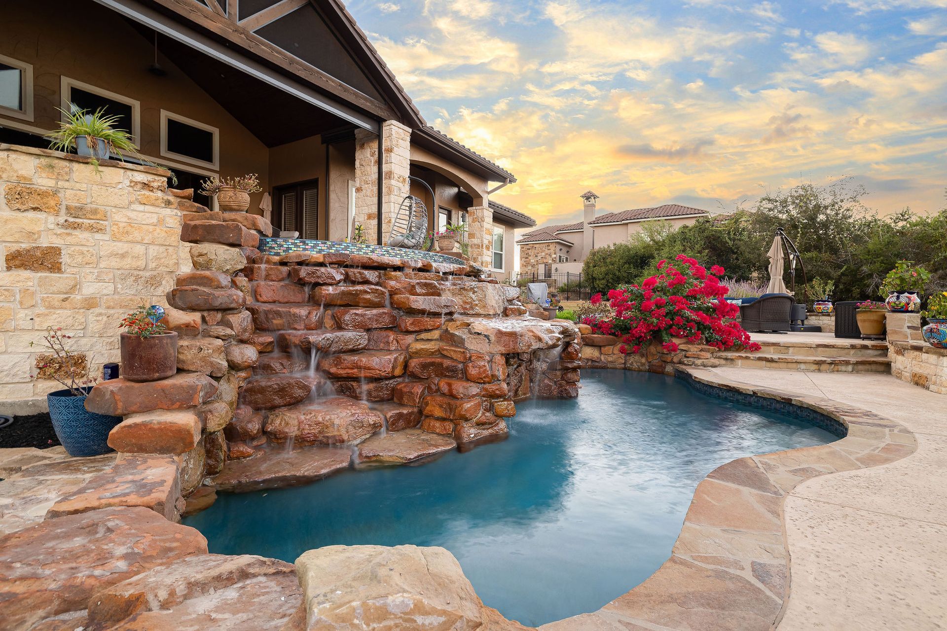 backyard pool at sunset