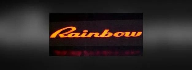Rainbow logo in orange cursive on a dark background