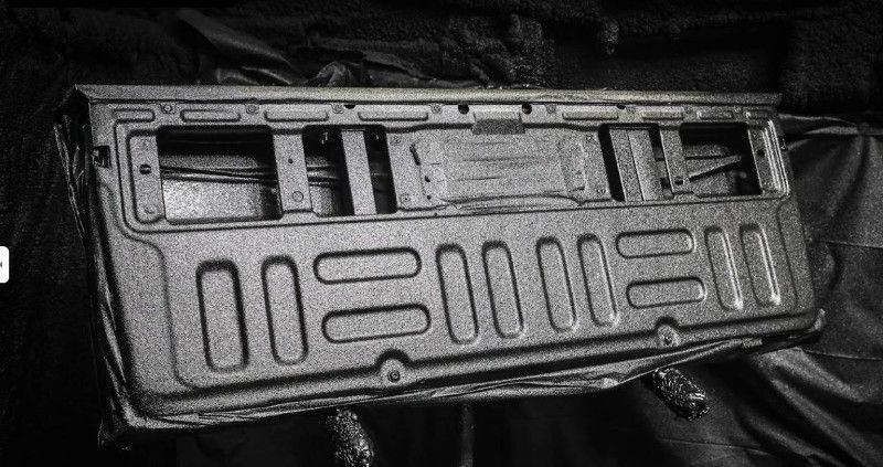 A close up of a truck bed with a spray on bedliner.