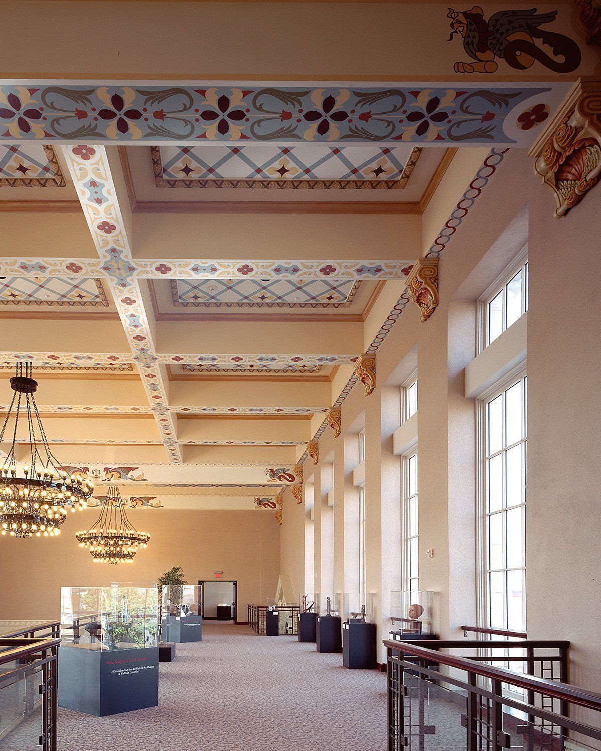 A long hallway with a dragon on the ceiling