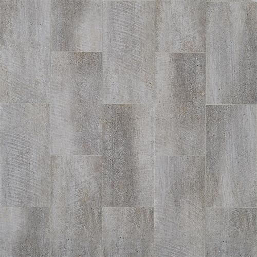 A close up of a gray tile floor.