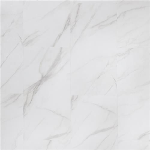 A close up of a white marble floor tile.