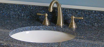 A customized bathroom sink and faucet