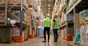 Hunter James Security emblem with American flags and eagle.