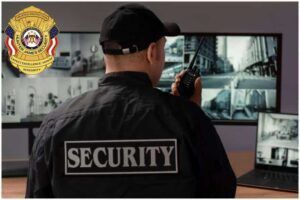 Hunter James Security emblem with American flags and eagle.