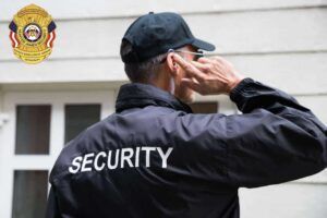 Hunter James Security emblem with American flags and eagle.