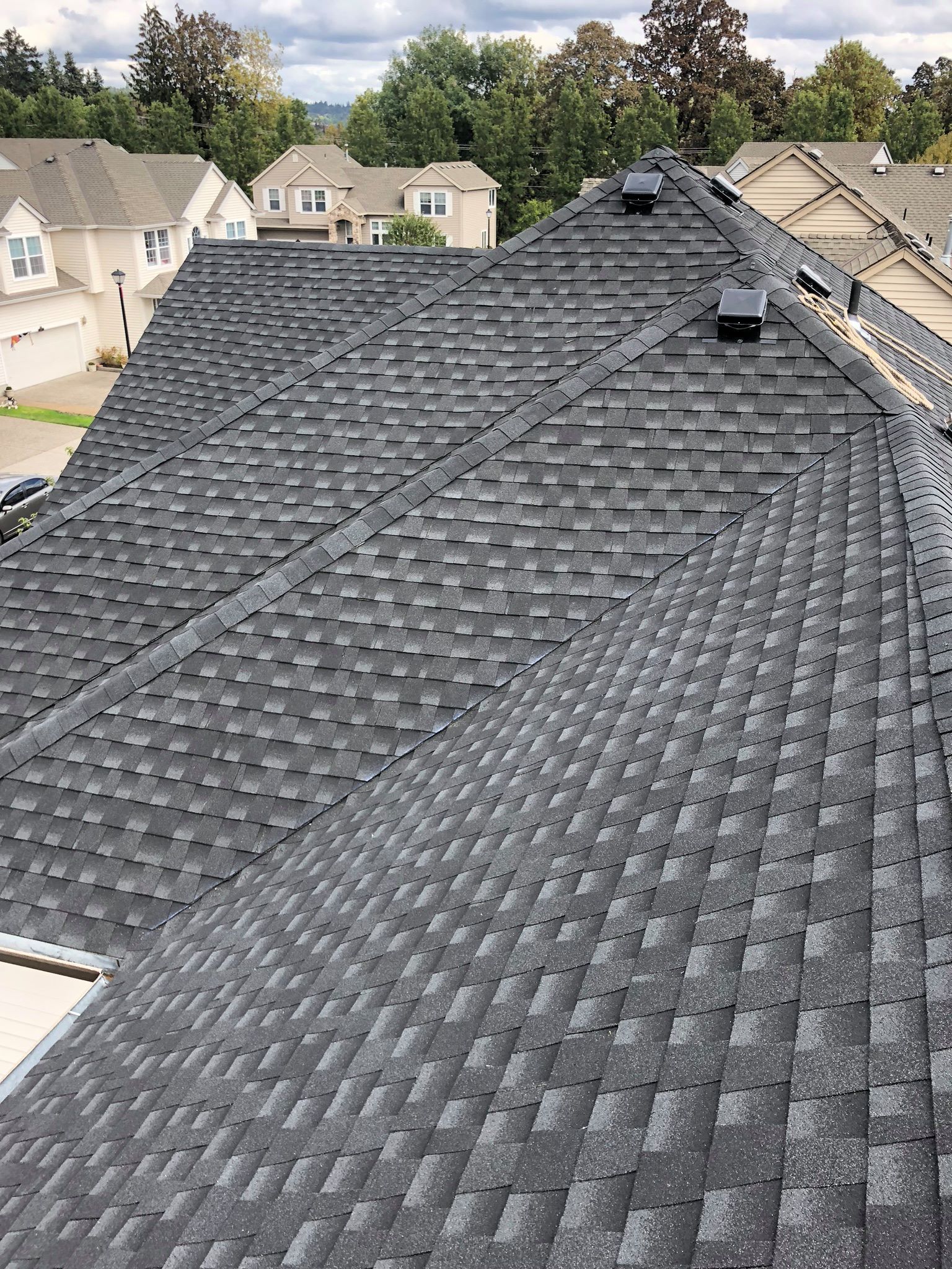 The roof of a house with a lot of shingles on it.