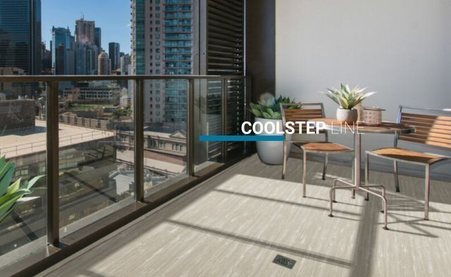 A balcony with a table and chairs and the words coolstep on the bottom