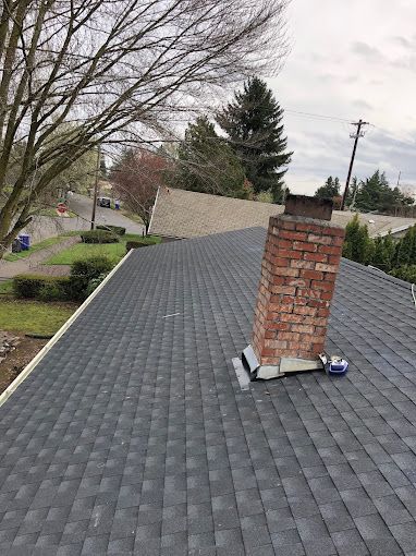 A roof with a chimney on top of it.