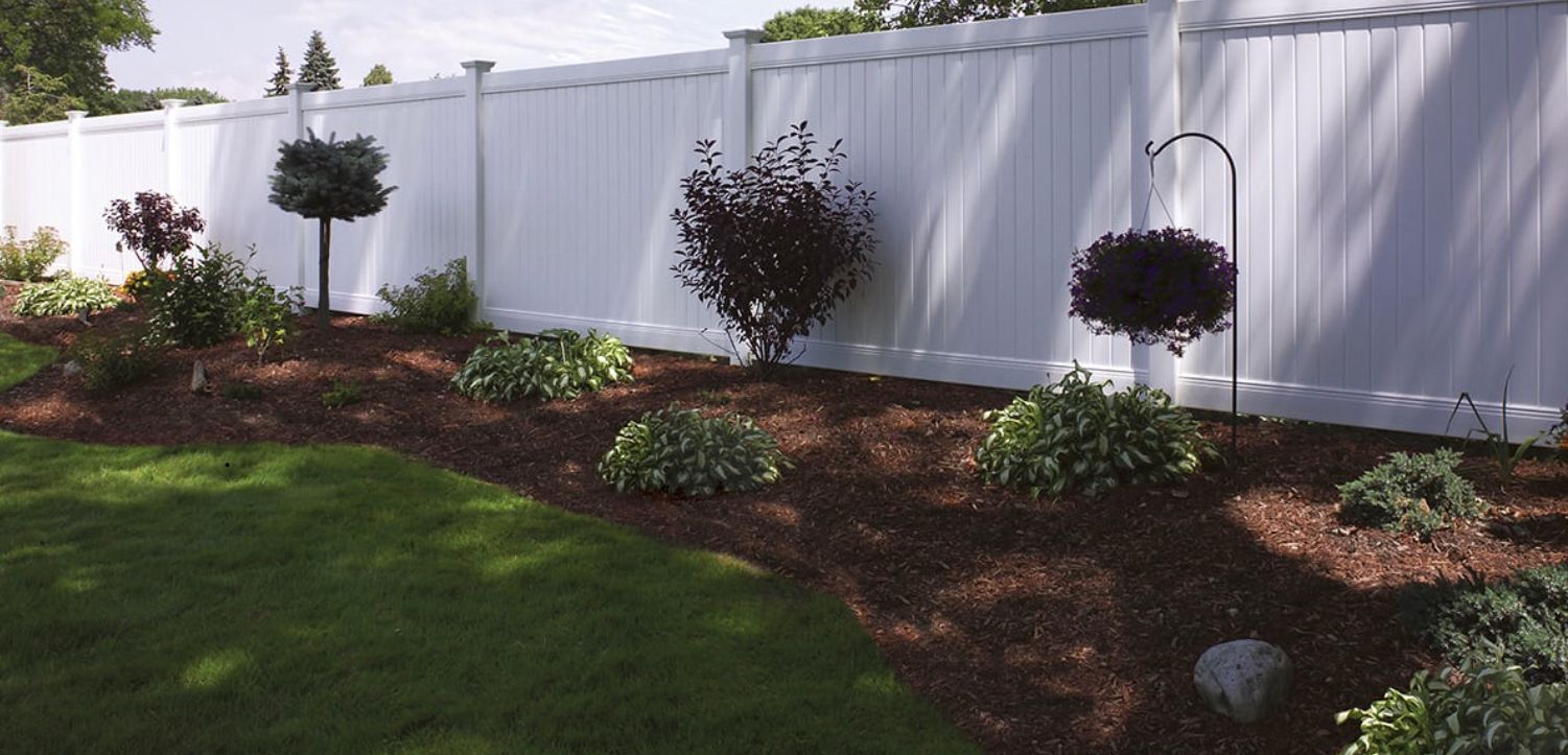 White vinyl fence