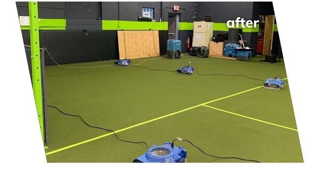 a picture of a tennis court after being cleaned