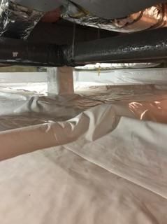 a close-up of a piece of plastic on the floor of a room