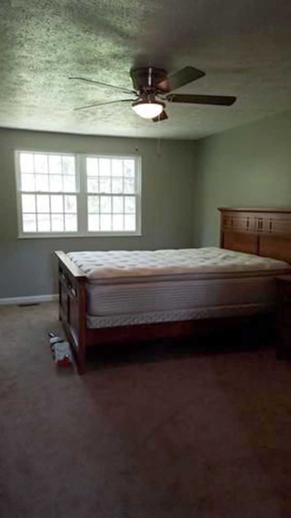 A room damaged by water after water damage restoration service