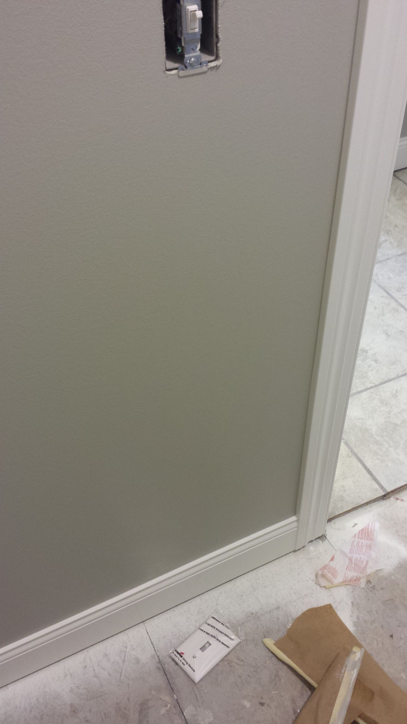 A close up of a wall with a hole in it.