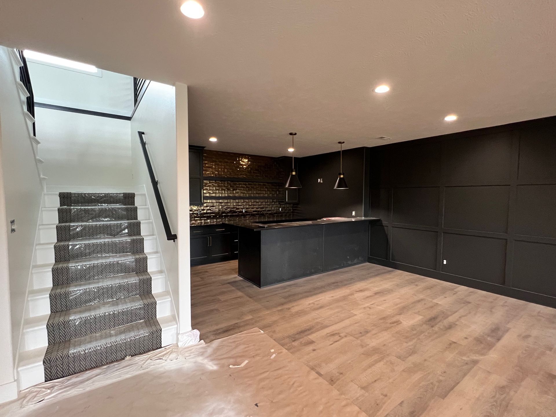 There is a staircase leading up to the second floor of a house.