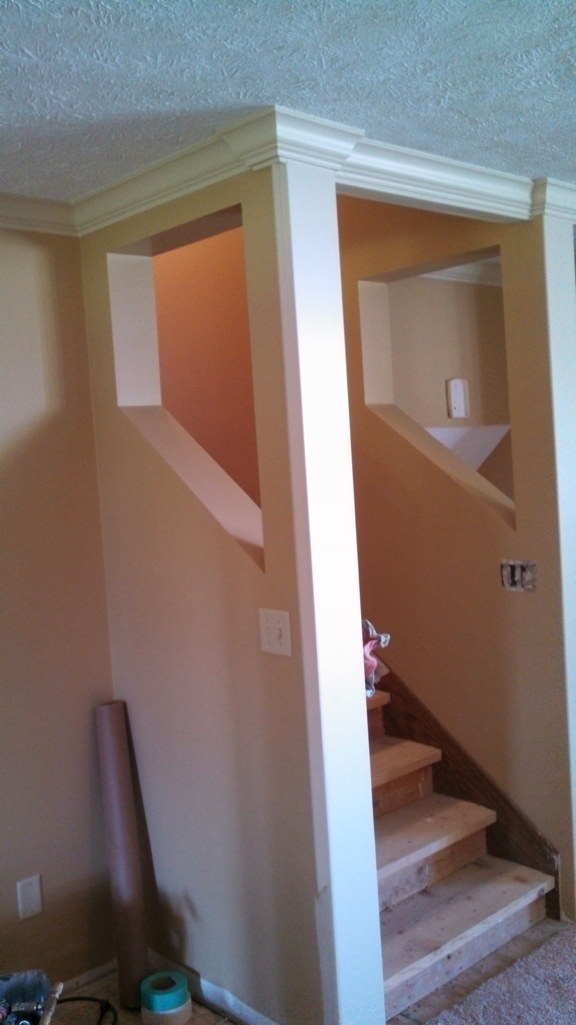 There is a staircase in the middle of the room.