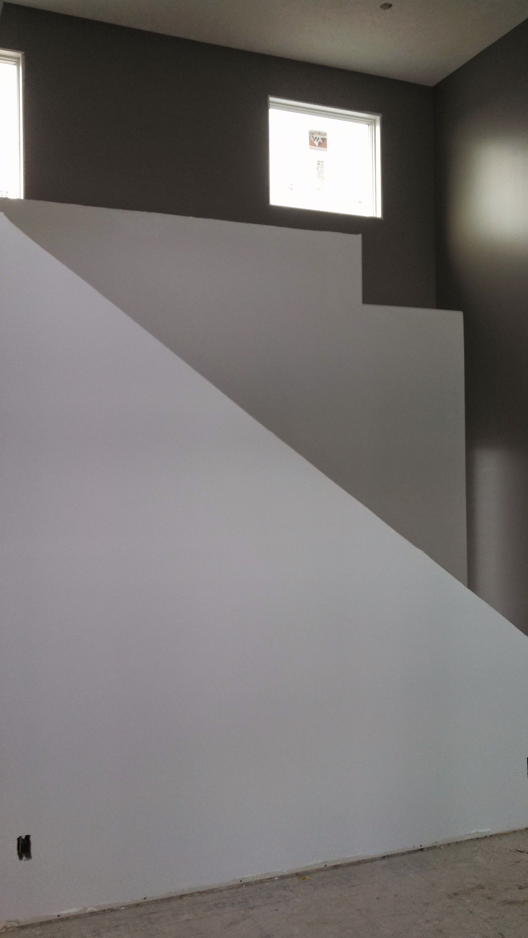 There is a staircase in the middle of the room.