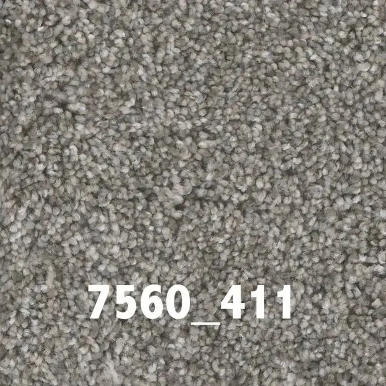 Close-up of gray-toned carpet with a textured surface; text 