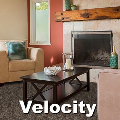 Living room with beige furniture, fireplace, dark coffee table, red wall, and 