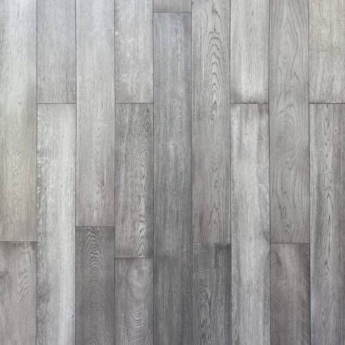 Gray wood flooring with vertical planks and visible wood grain.