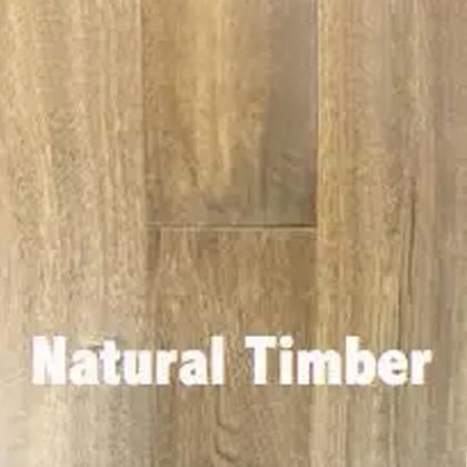 Close-up of natural timber floorboards, with subtle grain patterns and the words 