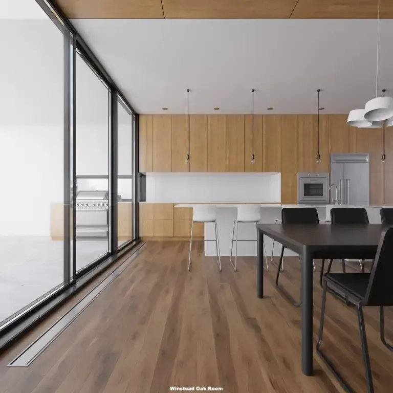 Modern kitchen with wooden cabinets, island, and dining table, large glass doors, and hardwood floor.