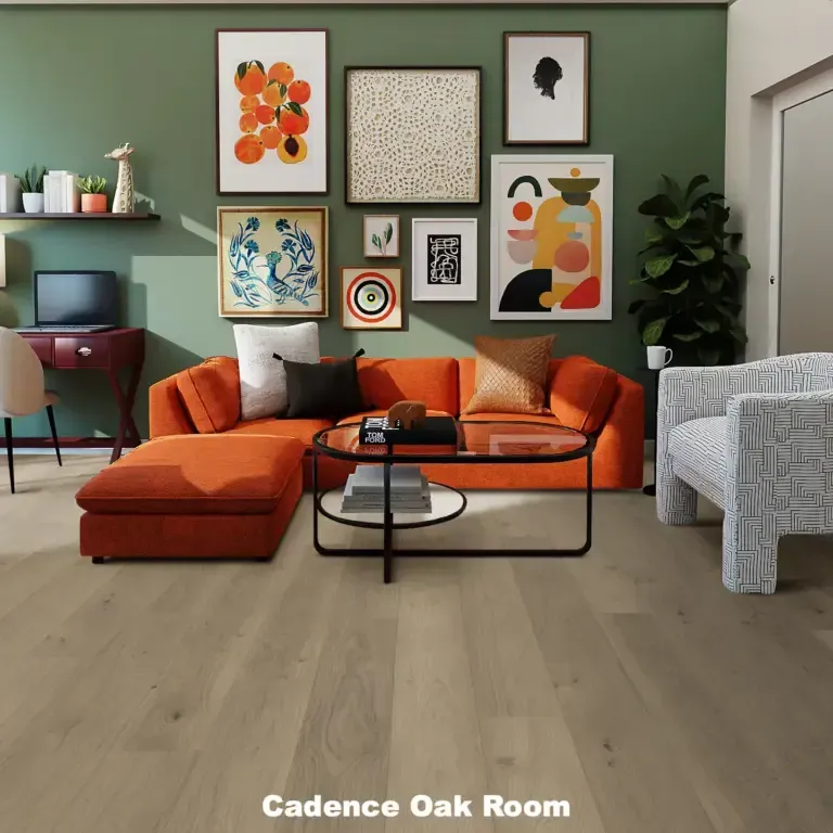 Living room with orange sofa, gallery wall, and light oak floors.