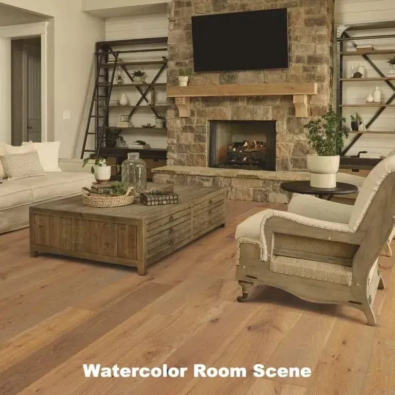 Living room with stone fireplace, wood floors, and rustic furniture.