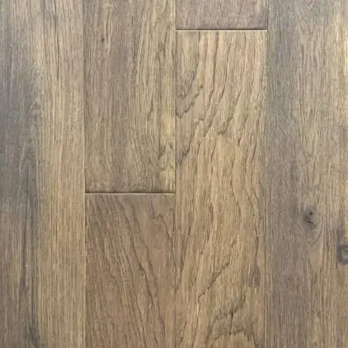 Close-up of wood flooring, showing vertical planks in shades of brown and gray with visible wood grain.