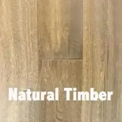 Close-up of natural timber floorboards, with subtle grain patterns and the words 