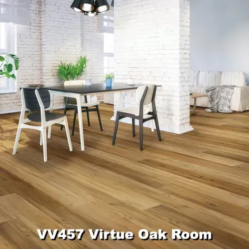 Room with wood-look flooring, dining table with chairs, and a white brick wall.
