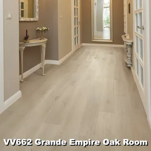 Hallway with light wood-look flooring, light walls, and decorative accents, including mirrors and a table.