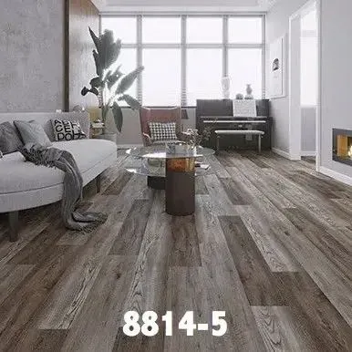 Living room with gray wood-look flooring, sofa, piano, and large windows.