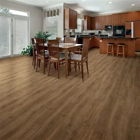 A spacious kitchen with brown hardwood floors, dining table, and dark wood cabinetry.