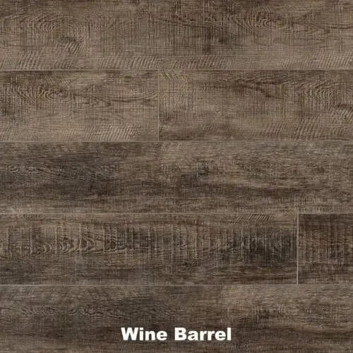 Close-up of hardwood flooring planks in shades of brown with a weathered appearance. Text reads 