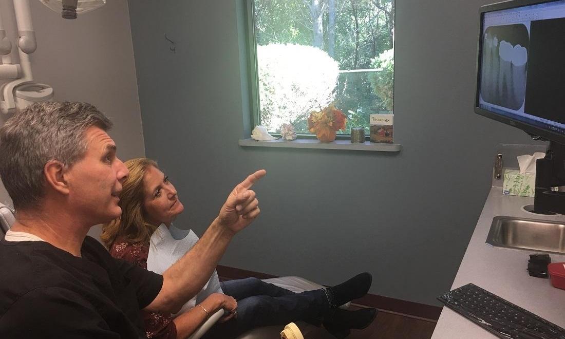 Dr. Hohm explaining treatment needed