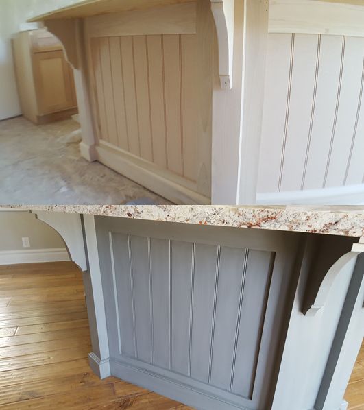 Two photos of a kitchen island. Top: wood-paneled, light colored island. Bottom: Same island, painted grey with granite countertop.
