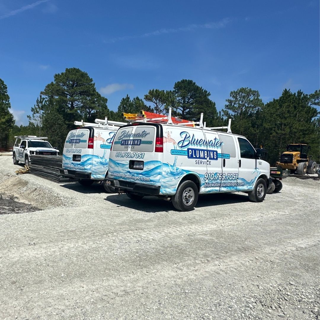 Two white work vans with