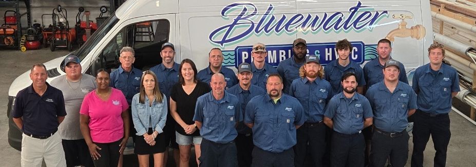 Group of people in front of a van with