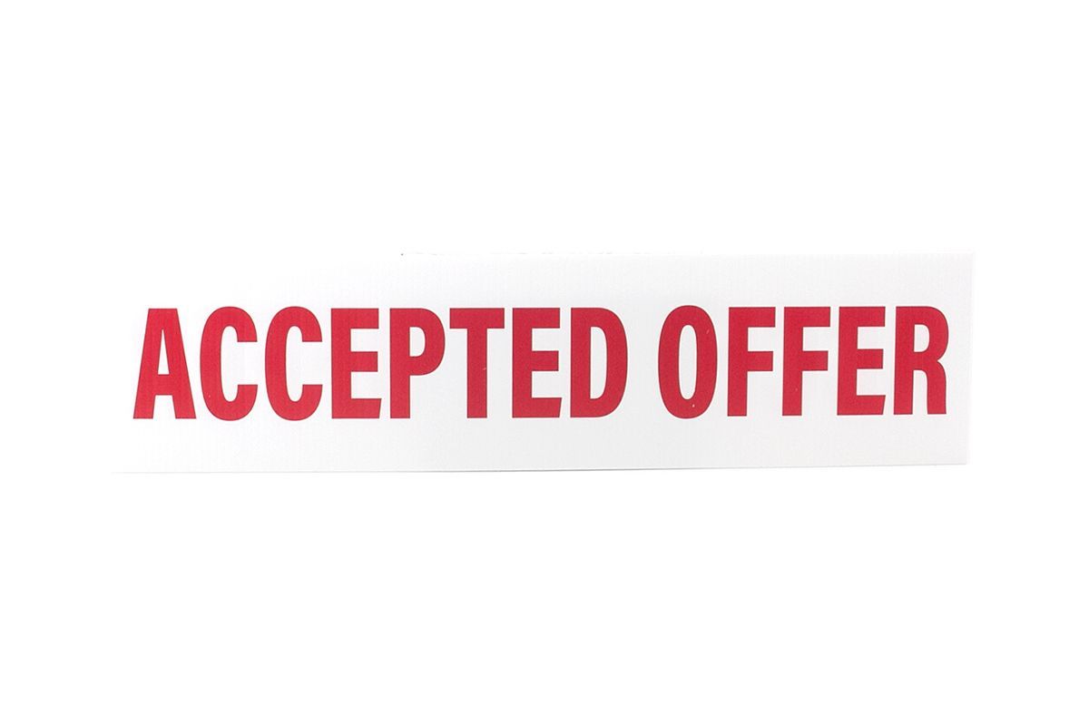 a red accepted offer sign on a white background .
