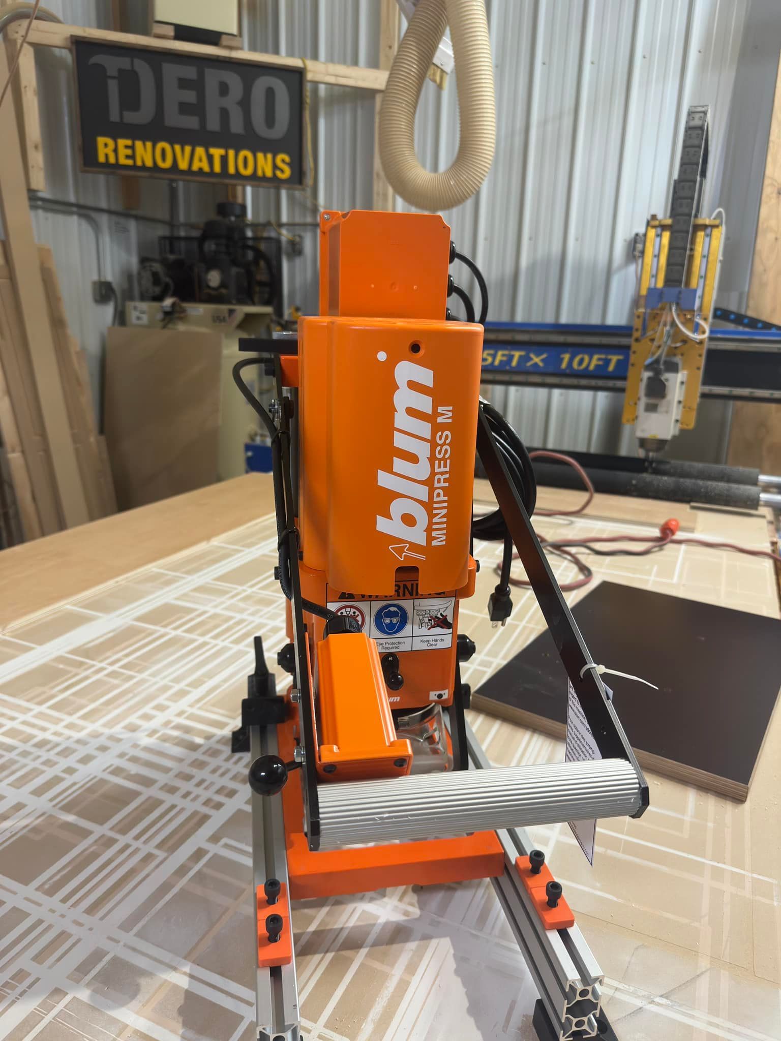 Orange Blum machining center in a workshop.