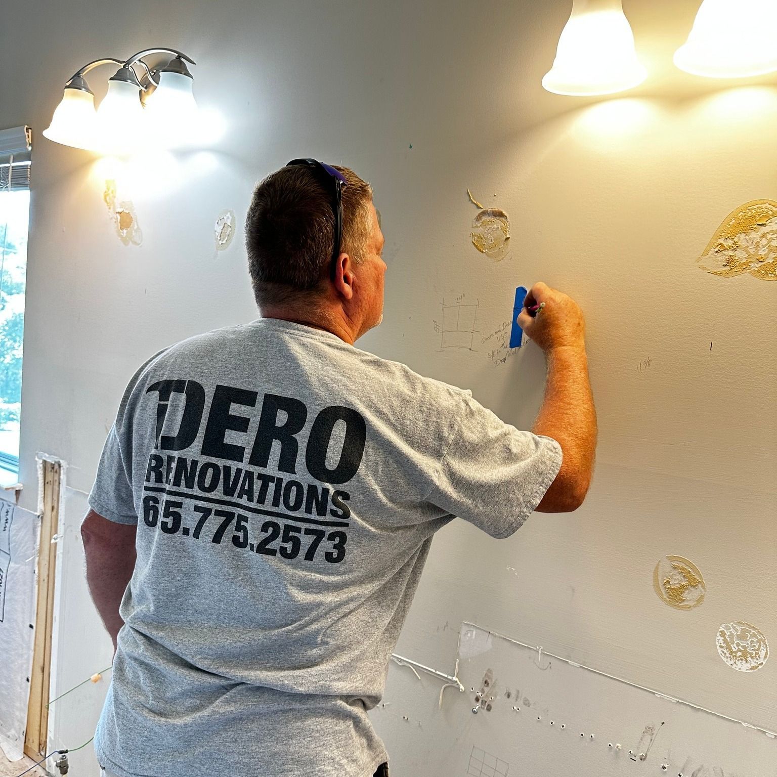 Man in gray shirt with 