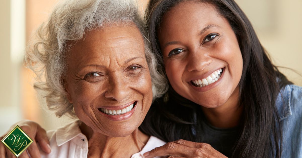 elderly woman standing with her daughter - Whispering Pines caregiver
