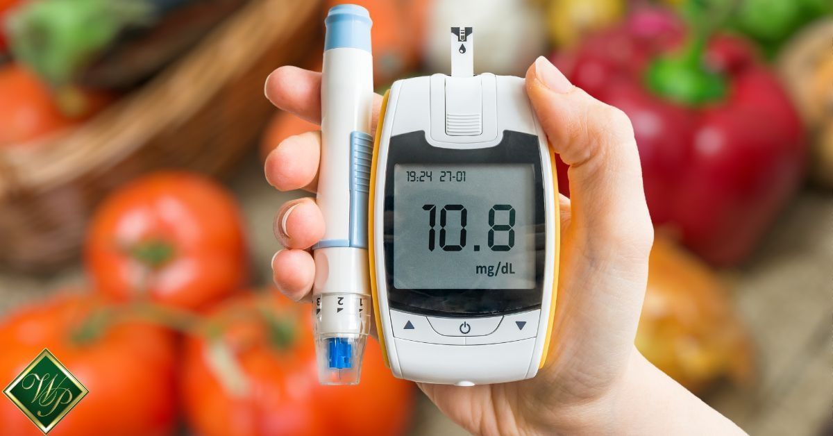 Hand holding a glucose meter showing 10.8 mg/dL, with a pen-shaped lancet and blurred vegetables in the background