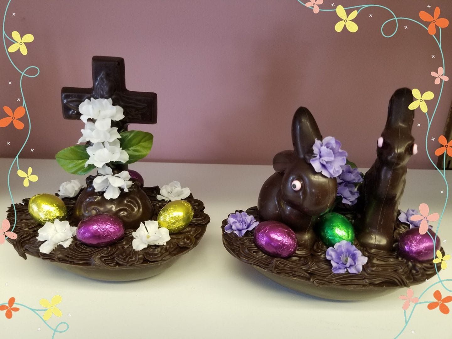 Chocolate Easter decorations: cross and bunnies, eggs, and flowers.