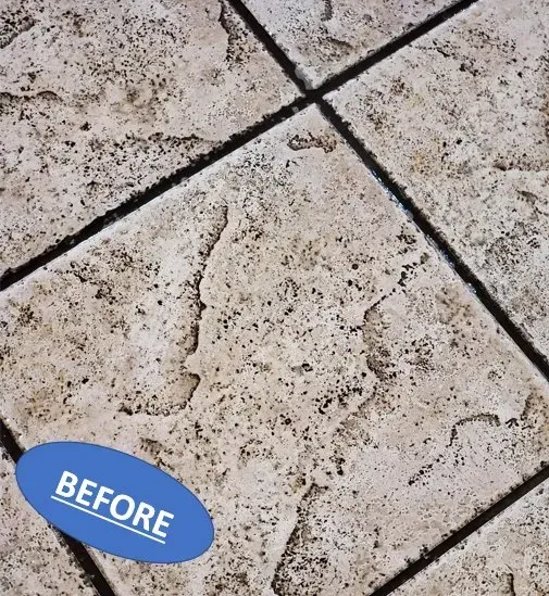 Before view of a stained beige tile floor with a blue 