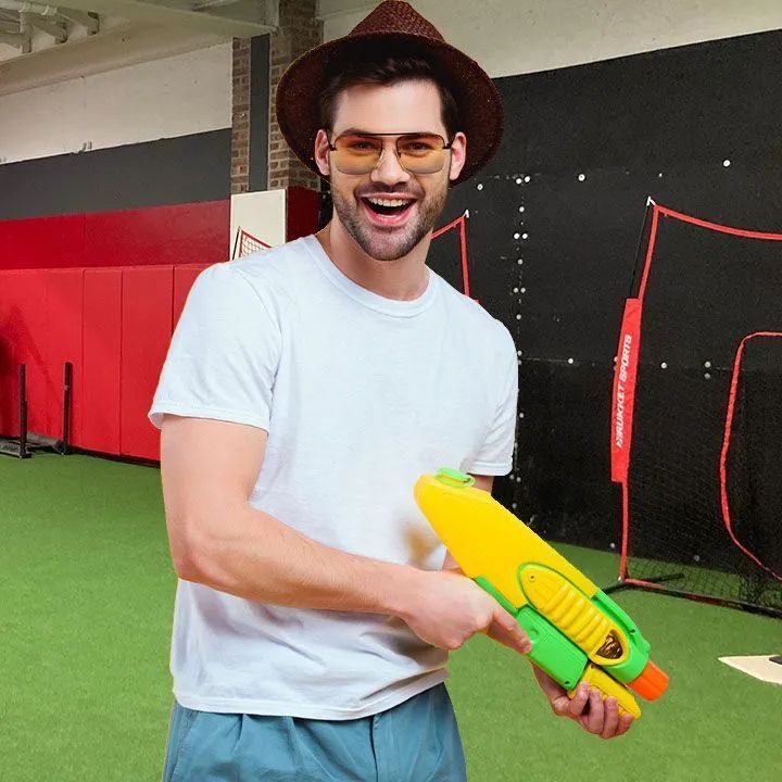 Man holding a toy gun.