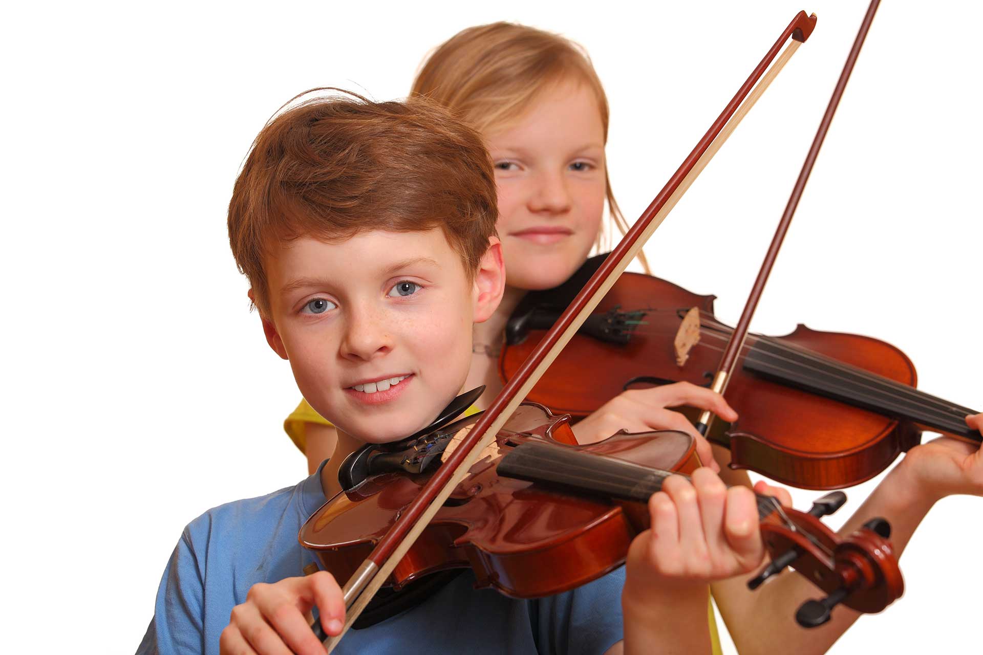 boy and girl playing their violins